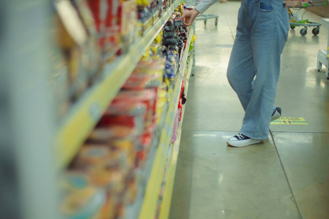 store detective observing shoppers